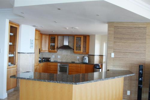 Η κουζίνα ή μικρή κουζίνα στο Unit 1101 Oyster Rock