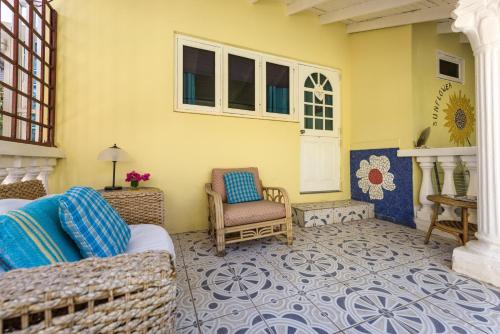 Un lugar para sentarse en Sunflower Villa Studios