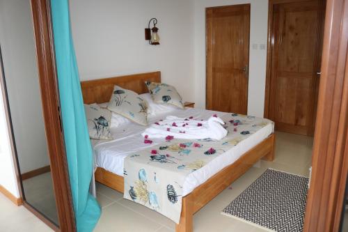 Ένα ή περισσότερα κρεβάτια σε δωμάτιο στο TAMA'S HOLIDAY APARTMENT