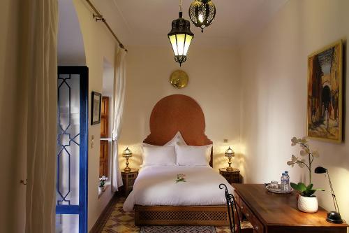 Llit o llits en una habitació de Riad Soundouss