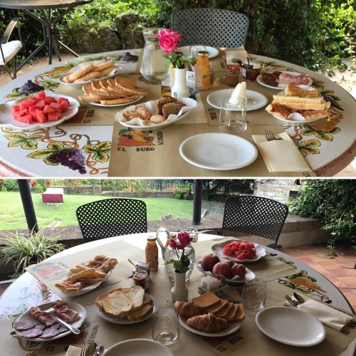 a table with plates of food on it at Agriturismo Poderi Zunino in Ponti