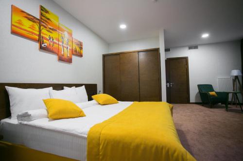 Ένα ή περισσότερα κρεβάτια σε δωμάτιο στο Da Vinci Boutique Hotel