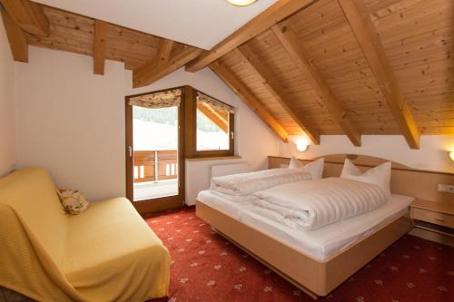 Posteľ alebo postele v izbe v ubytovaní Hotel Garni Försterheim