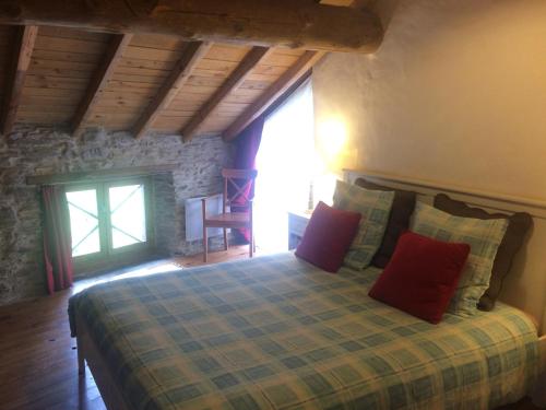 Кровать или кровати в номере Les Granges d'Ignaux