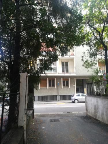 a building with a car parked in front of it at Staurenghi34apartmenT in Varese