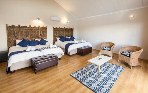 Postel nebo postele na pokoji v ubytování Witfontein Game Lodge