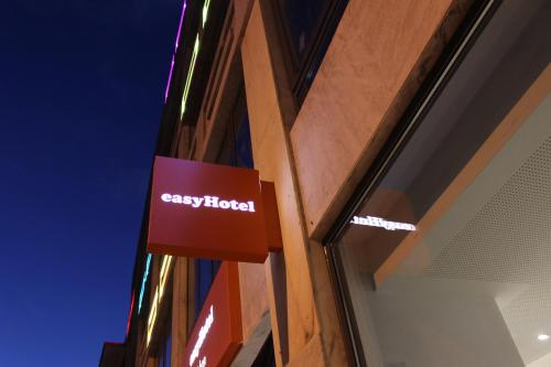 a scientology sign on the side of a building at easyHotel Lisbon in Lisbon