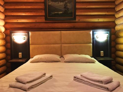 Postel nebo postele na pokoji v ubytování IZKI Eco Resort