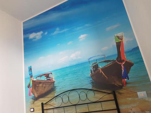 a painting of two boats in the water at Bed Rho Stazione - Fiera in Rho