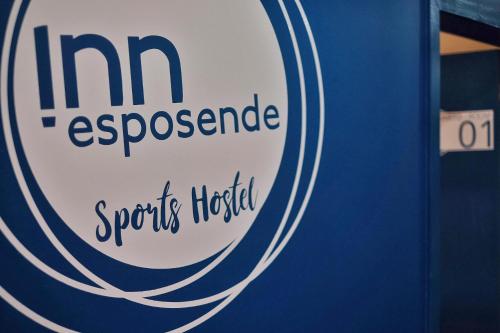 a sign for an inn escassade spins hotel at InnEsposende Sports Hostel in Esposende