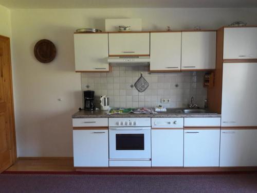 Kuchyň nebo kuchyňský kout v ubytování Haus Hauser