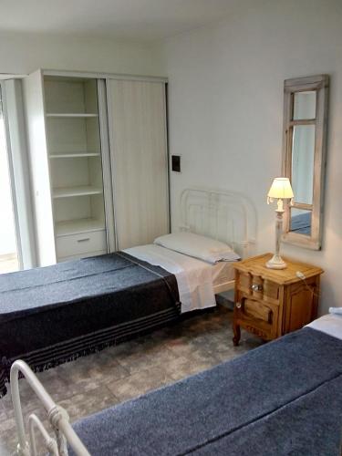 Llit o llits en una habitació de DTO SERRANO