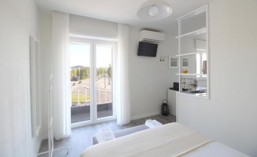 Kuchyň nebo kuchyňský kout v ubytování JR Studios & Suites I Rius I