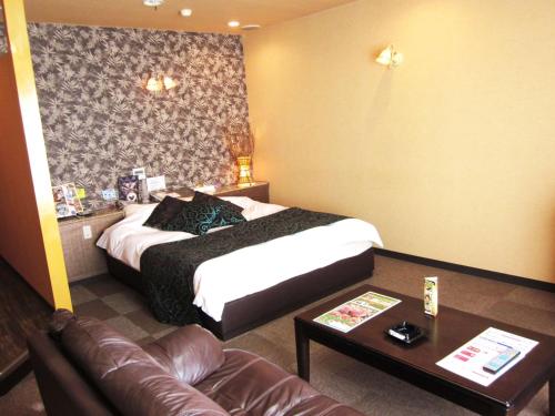 Voodi või voodid majutusasutuse Pal Hotel Isahaya (Love Hotel) toas