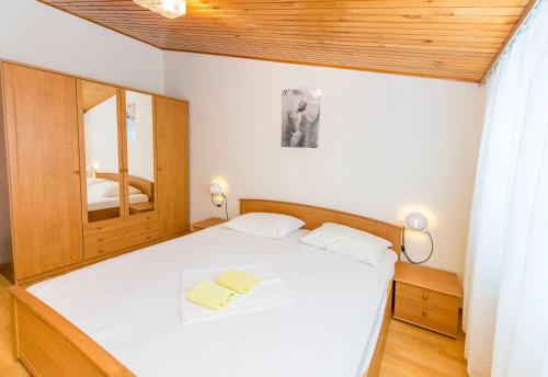 Posteľ alebo postele v izbe v ubytovaní Apartments Jere Proto