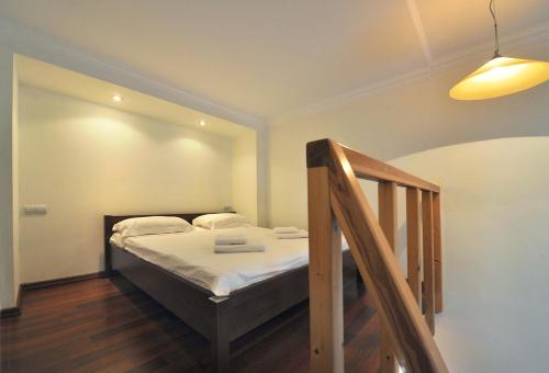 Llit o llits en una habitació de Apartments on Deribasovskaya