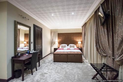 Ένα ή περισσότερα κρεβάτια σε δωμάτιο στο Border Hotel