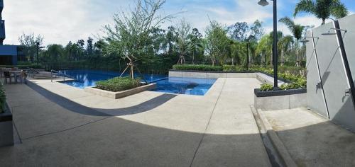 Bazén v ubytování Lumpini Cha-am SeaView by Chalitta nebo v jeho okolí