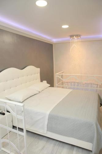 Ένα ή περισσότερα κρεβάτια σε δωμάτιο στο Casa D'Amore