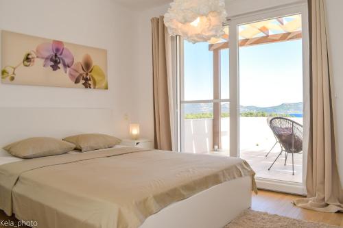 Ένα ή περισσότερα κρεβάτια σε δωμάτιο στο Apartment Leslie