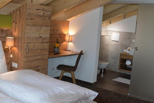 Ein Bett oder Betten in einem Zimmer der Unterkunft Pension Alpenblick