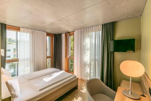 Postelja oz. postelje v sobi nastanitve Green City Hotel Vauban