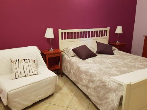 Postel nebo postele na pokoji v ubytování Casa Vacanza Rosa