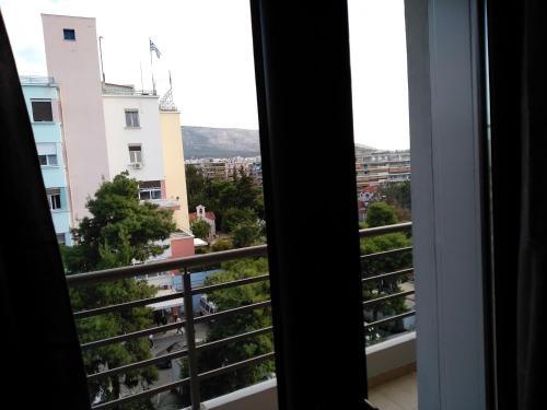 a view from a window of a city at Paidon Studio in Athens