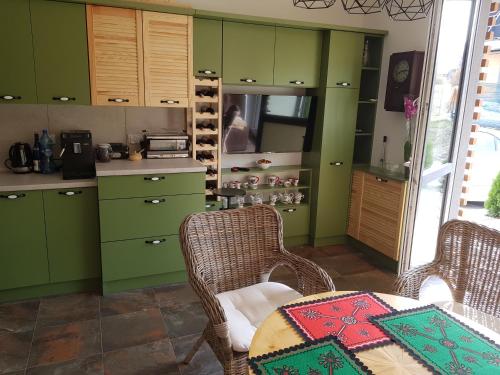 Kuchyňa alebo kuchynka v ubytovaní Apartament Zielony
