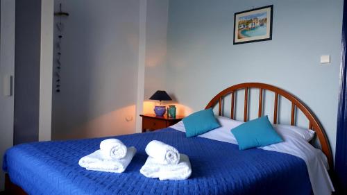 Katil atau katil-katil dalam bilik di Jenny's Sea View House