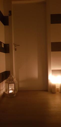 a room with a clock in the corner of a room at Marselo B&B in Bari