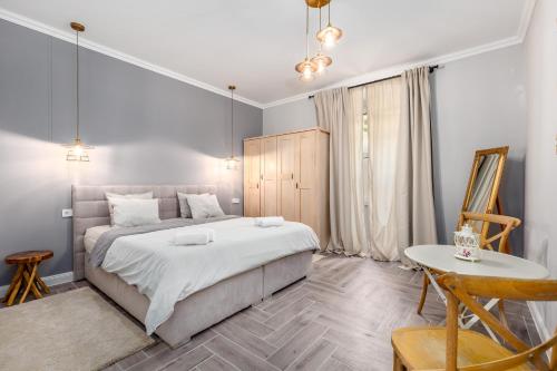 Postel nebo postele na pokoji v ubytování Karolina apartment #2