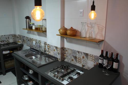 Η κουζίνα ή μικρή κουζίνα στο Rosa Surf Hostel & Food