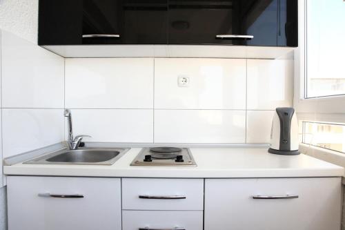 Η κουζίνα ή μικρή κουζίνα στο Ristevski Apartments