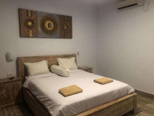 Ein Bett oder Betten in einem Zimmer der Unterkunft Cantika Guest House