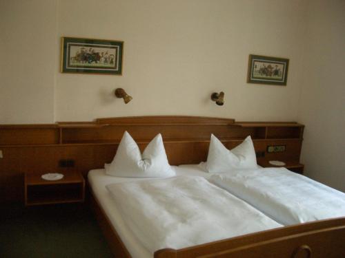 Ένα ή περισσότερα κρεβάτια σε δωμάτιο στο Haus-Maria
