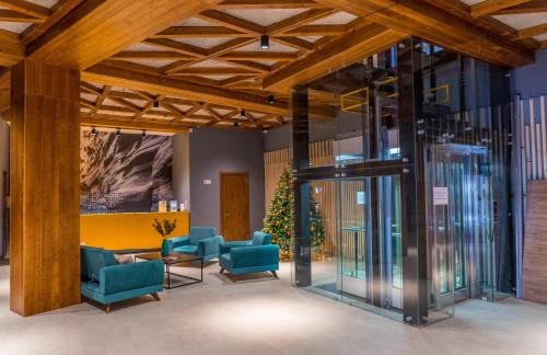 The lobby or reception area at The Valley Bakuriani