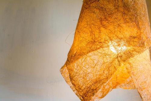 a close up of a piece of art on a wall at Pasa in Fushan