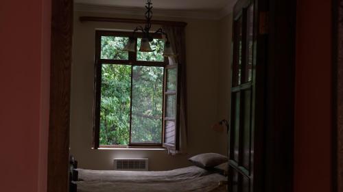 Un ou plusieurs lits dans un hébergement de l'établissement Takht House