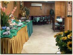 a room with a counter with flowers on it at Hotel Concorde Dokki in Cairo
