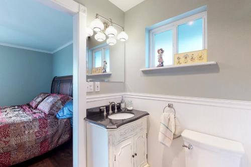 a bathroom with a sink and a toilet at Westport Marina View in Westport