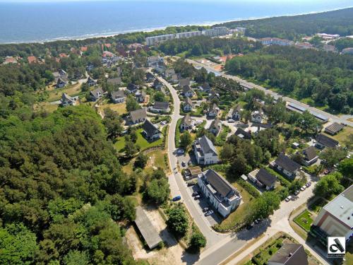 an aerial view of a town with houses and a road at Lotsenstieg 2 Kajuete 03 in Ostseebad Karlshagen