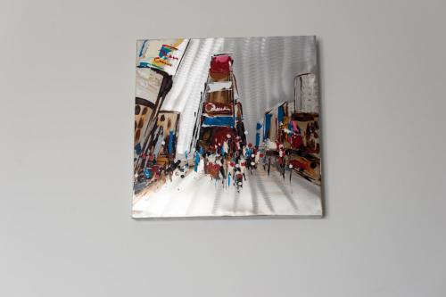 a group of people walking down a city street at The Originals City, Hôtel Le Savoy, Caen in Caen
