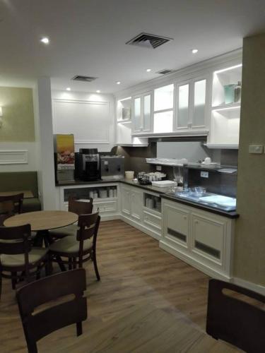 Кухня или мини-кухня в Hotel Do Centro
