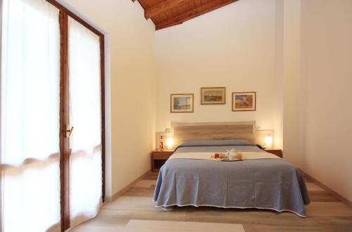 Cama o camas de una habitación en Hotel Colomber
