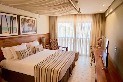 Cama ou camas em um quarto em Samoa Beach Resort