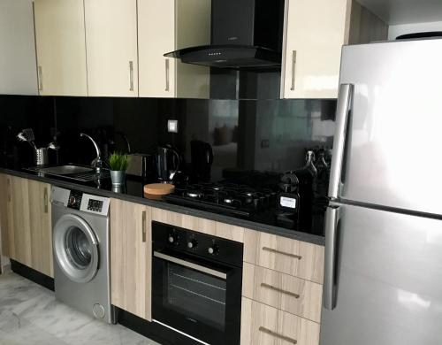 Una cocina o zona de cocina en Appartement les pieds dans l'eau WELCOME STAY