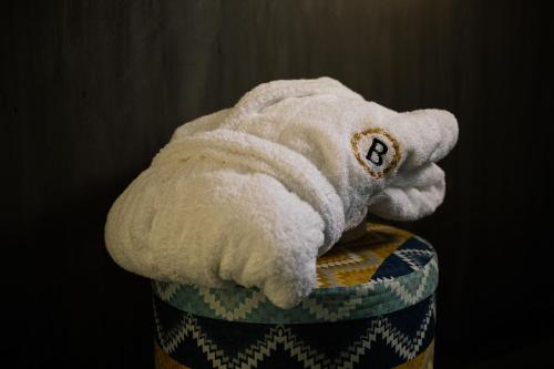 a stuffed elephant is sitting on top of a container at Belvedere Luxury Apartments & Spa in Plakias