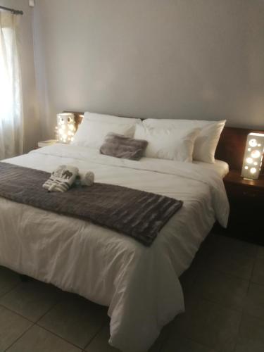 Katil atau katil-katil dalam bilik di Cape Pine Guest House