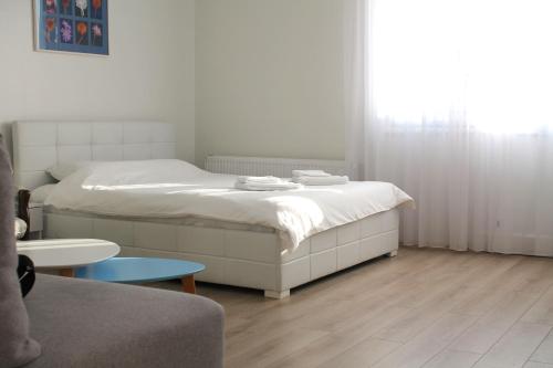 Voodi või voodid majutusasutuse Rooftop Apartment Belgrade toas